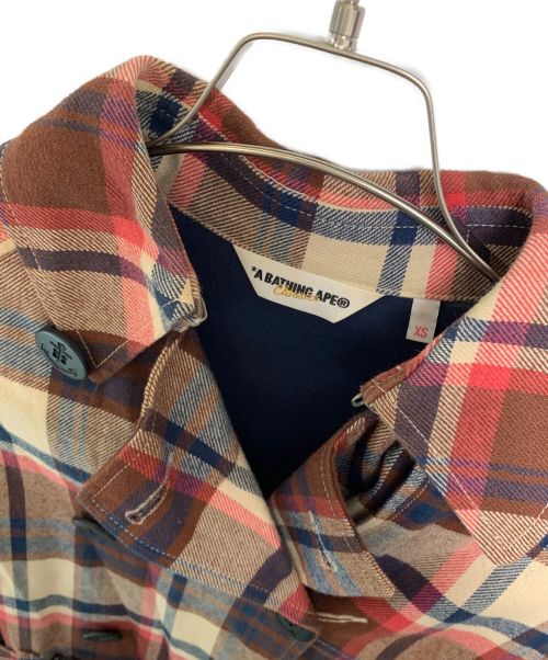 A BATHING APE Classics（ァ・ベイシング・エイプ クラシックス）A BATHING APE Classics (ァ・ベイシング・エイプ クラシックス) トレンチコート レッド×ブラウン サイズ:XSの古着・服飾アイテム