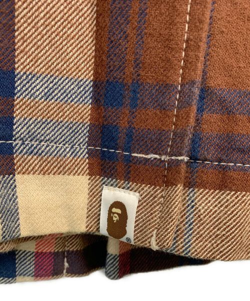 A BATHING APE Classics（ァ・ベイシング・エイプ クラシックス）A BATHING APE Classics (ァ・ベイシング・エイプ クラシックス) トレンチコート レッド×ブラウン サイズ:XSの古着・服飾アイテム