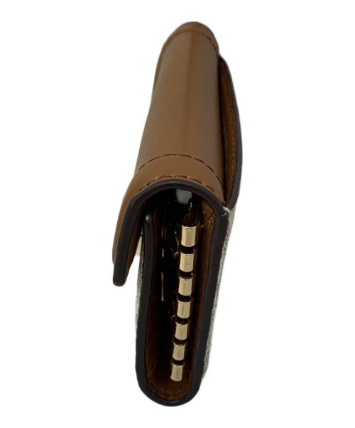 MICHAEL KORS（マイケル・コース）MICHAEL KORS (マイケルコース) MICHAEL KORS キーケース ブラウン×ホワイトの古着・服飾アイテム