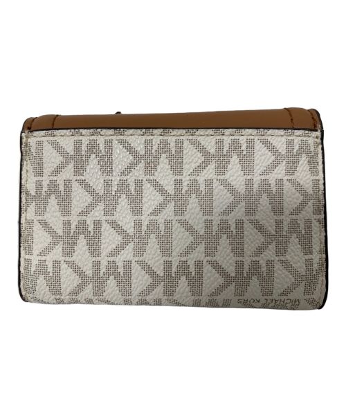 MICHAEL KORS（マイケル・コース）MICHAEL KORS (マイケルコース) MICHAEL KORS キーケース ブラウン×ホワイトの古着・服飾アイテム