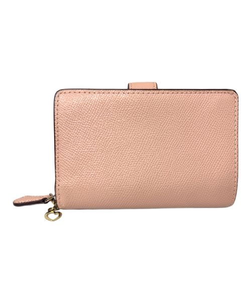 COACH（コーチ）COACH (コーチ) COACH 2つ折り財布 ピンクの古着・服飾アイテム