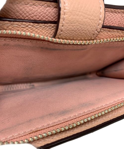 COACH（コーチ）COACH (コーチ) COACH 2つ折り財布 ピンクの古着・服飾アイテム