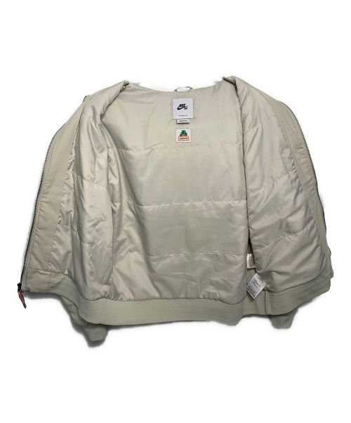 NIKE SB（ナイキエスビー）NIKE SB (ナイキエスビー) JARRITOS (ハリトス) NIKE SB JARRITOS Padded Jacket パーカー アイボリー サイズ:Lの古着・服飾アイテム