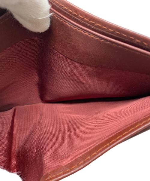 Cartier（カルティエ）Cartier (カルティエ) Cartier 2つ折り財布 ボルドーの古着・服飾アイテム