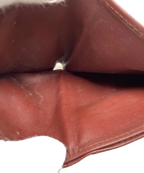 Cartier（カルティエ）Cartier (カルティエ) Cartier 2つ折り財布 ボルドーの古着・服飾アイテム