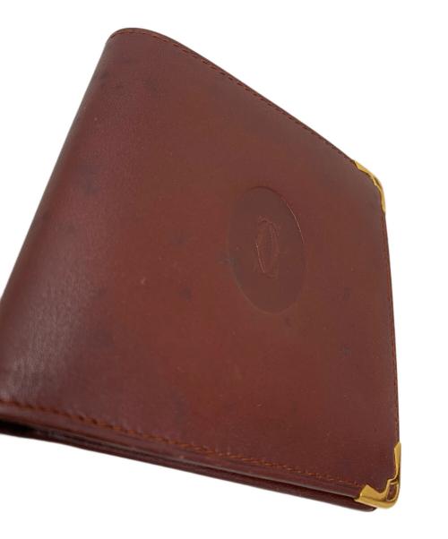 Cartier（カルティエ）Cartier (カルティエ) Cartier 2つ折り財布 ボルドーの古着・服飾アイテム
