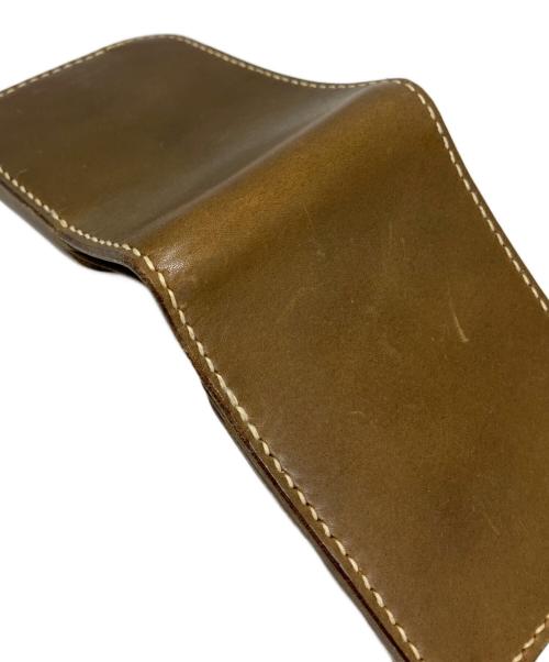 minca（ミンカ）minca (ミンカ) minca 2つ折り財布 ブラウンの古着・服飾アイテム