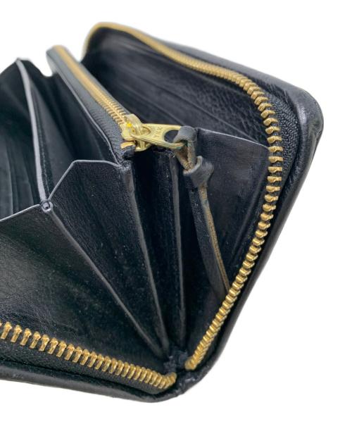 vegetable tanned leather（ベジタブルタンドレザー）vegetable tanned leather (ベジタブルタンドレザー) vegetable tanned leather ラウンドファスナー財布 ブラックの古着・服飾アイテム