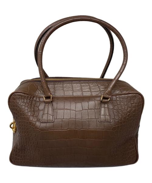 Accessoires De Mademoiselle（アクセソワ・ドゥ・マドモアゼル）Accessoires De Mademoiselle (アクセソワ・ドゥ・マドモアゼル) Accessoires De Mademoiselle 型押しハンドバッグ ブラウンの古着・服飾アイテム