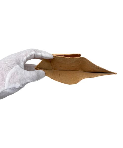 IL BISONTE（イル ビゾンテ）IL BISONTE (イル ビゾンテ) 2つ折り財布 オレンジの古着・服飾アイテム