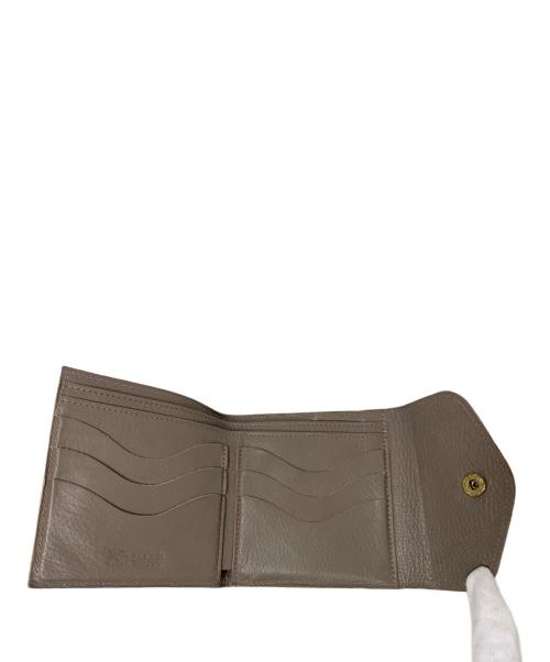 IL BISONTE（イル ビゾンテ）IL BISONTE (イル ビゾンテ) IL BISONTE クラフトエンボスドロゴ 財布 ベージュの古着・服飾アイテム