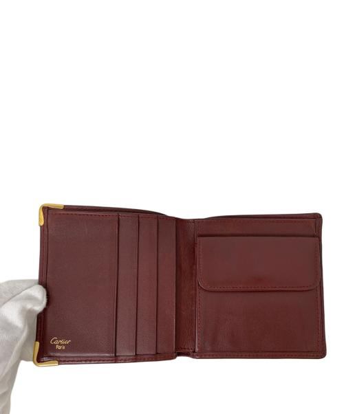 Cartier（カルティエ）Cartier (カルティエ) Cartier 2つ折り財布 ワインレッドの古着・服飾アイテム