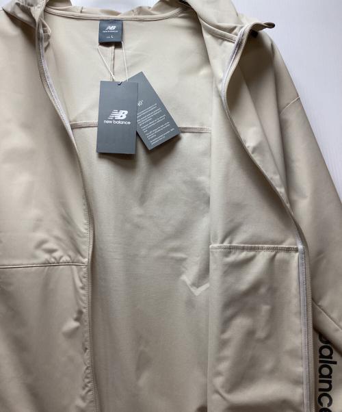 NEW BALANCE（ニューバランス）NEW BALANCE (ニューバランス) フーデッドウーブンジャケット ベージュ サイズ:Lの古着・服飾アイテム