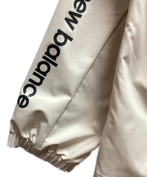 NEW BALANCE（ニューバランス）NEW BALANCE (ニューバランス) フーデッドウーブンジャケット ベージュ サイズ:Lの古着・服飾アイテム