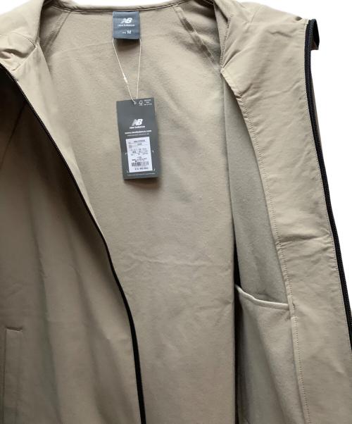 NEW BALANCE（ニューバランス）NEW BALANCE (ニューバランス) フーデットウーブンジャケット ベージュ サイズ:Mの古着・服飾アイテム