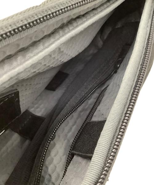 TUMI（トゥミ）TUMI (トゥミ) ボディバッグ ネイビーの古着・服飾アイテム