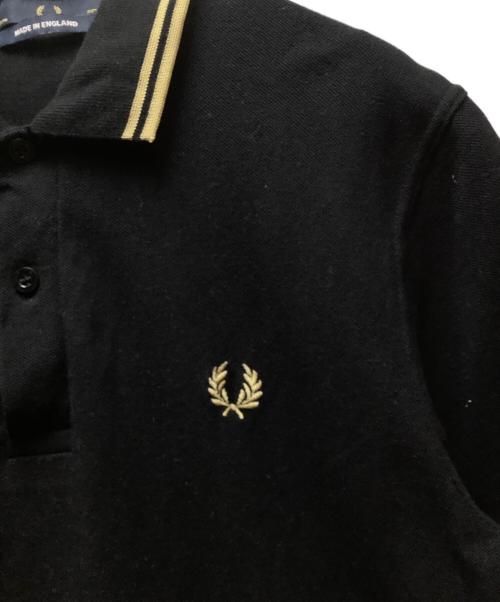 FRED PERRY（フレッドペリー）FRED PERRY (フレッドペリー) 半袖ポロシャツ ブラック×イエロー サイズ:38の古着・服飾アイテム