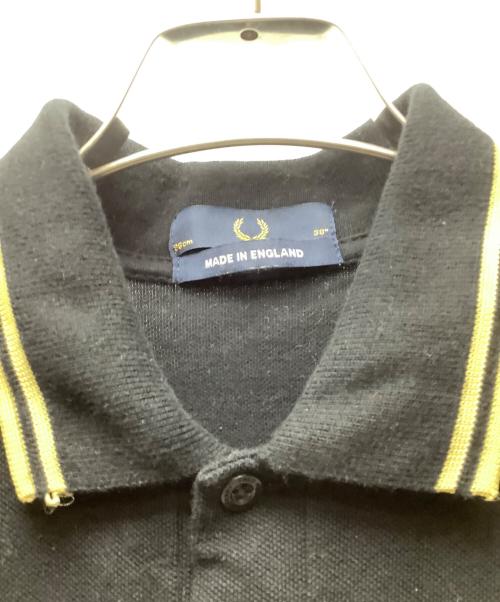 FRED PERRY（フレッドペリー）FRED PERRY (フレッドペリー) 半袖ポロシャツ ブラック×イエロー サイズ:38の古着・服飾アイテム