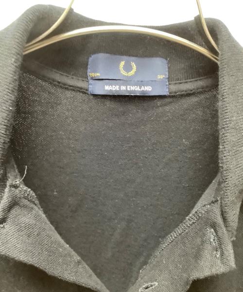 FRED PERRY（フレッドペリー）FRED PERRY (フレッドペリー) 半袖ポロシャツ ブラック×イエロー サイズ:38の古着・服飾アイテム
