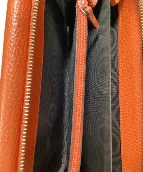 GUCCI（グッチ）GUCCI (グッチ) ラウンドファスナー財布 オレンジの古着・服飾アイテム