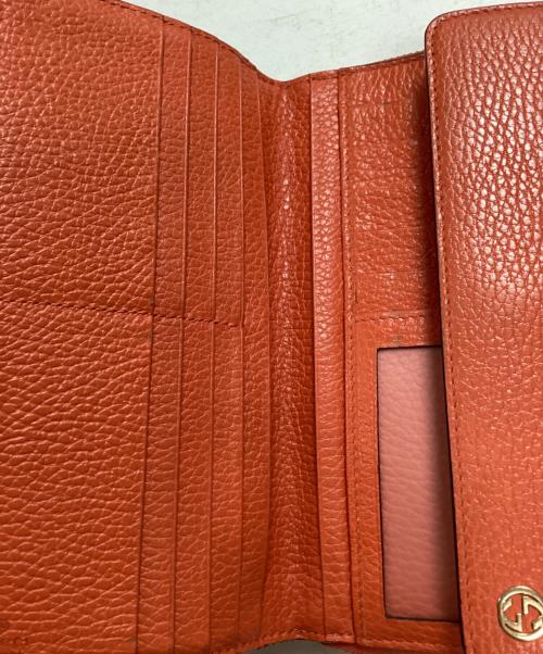GUCCI（グッチ）GUCCI (グッチ) ラウンドファスナー財布 オレンジの古着・服飾アイテム