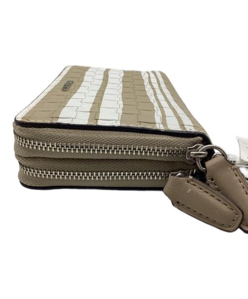 COACH（コーチ）COACH (コーチ) ラウンドジップ財布 ベージュ×ホワイトの古着・服飾アイテム