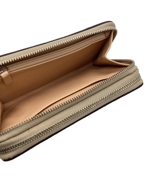 COACH（コーチ）COACH (コーチ) ラウンドジップ財布 ベージュ×ホワイトの古着・服飾アイテム