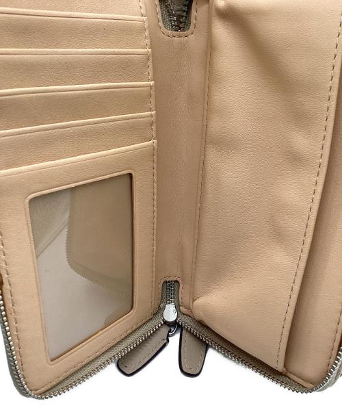 COACH（コーチ）COACH (コーチ) ラウンドジップ財布 ベージュ×ホワイトの古着・服飾アイテム