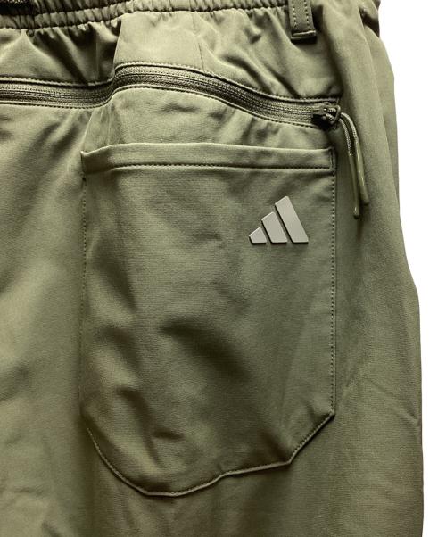 adidas（アディダス）adidas (アディダス) コードカオス ワイドテーパードパンツ オリーブ サイズ:L 未使用品の古着・服飾アイテム