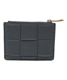 BOTTEGA VENETA（ボッテガベネタ）の古着「2つ折り財布」｜グレー