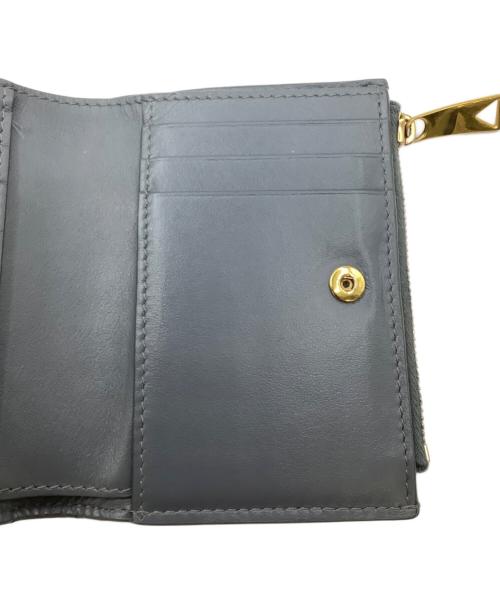 BOTTEGA VENETA（ボッテガベネタ）BOTTEGA VENETA (ボッテガベネタ) 2つ折り財布 グレーの古着・服飾アイテム