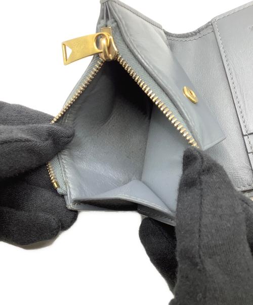 BOTTEGA VENETA（ボッテガベネタ）BOTTEGA VENETA (ボッテガベネタ) 2つ折り財布 グレーの古着・服飾アイテム