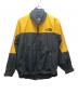 THE NORTH FACE（ザ ノース フェイス）の古着「ナイロンジャケット」｜イエロー×ブラック