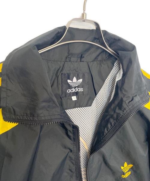 adidas（アディダス）adidas (アディダス) ナイロンジャケット ブラック×イエロー サイズ:Mの古着・服飾アイテム