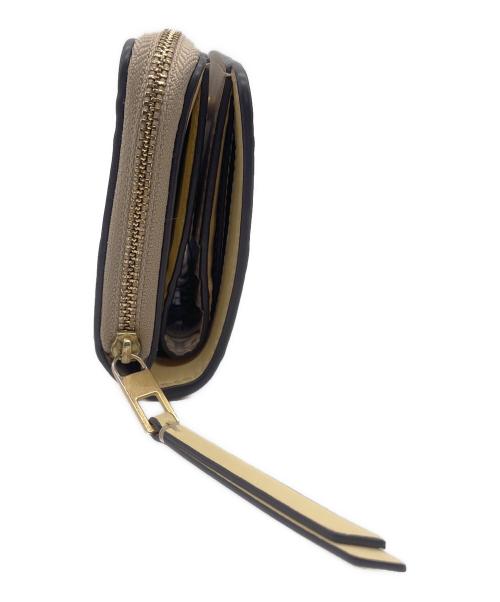 TORY BURCH（トリーバーチ）TORY BURCH (トリーバーチ) 2つ折り財布 ライトグレーの古着・服飾アイテム