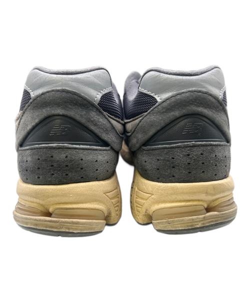 NEW BALANCE（ニューバランス）NEW BALANCE (ニューバランス) M2002RHO DARK NAVY 22SS-I グレー×ホワイト サイズ:27の古着・服飾アイテム