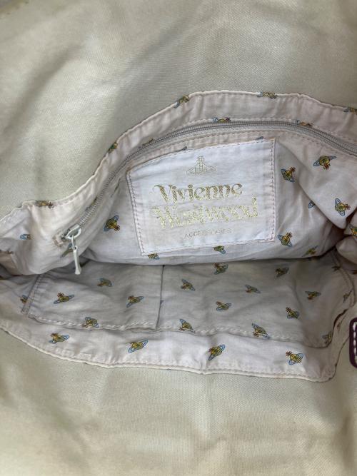 Vivienne Westwood（ヴィヴィアンウエストウッド）Vivienne Westwood (ヴィヴィアンウエストウッド) キャンバスショルダーバッグ ベージュの古着・服飾アイテム