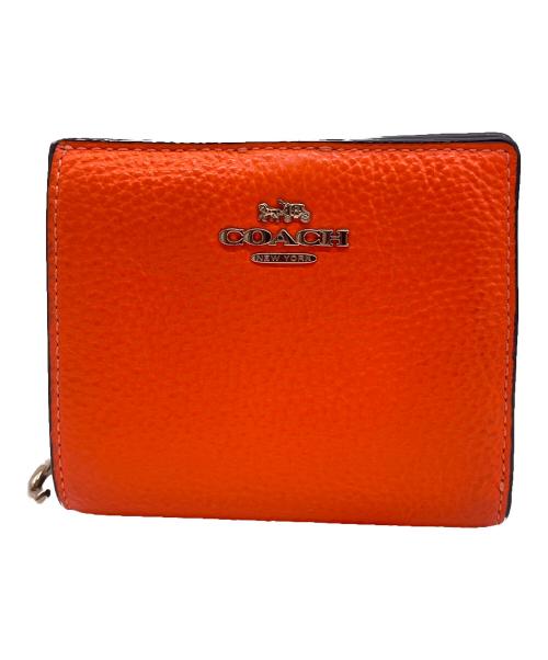 COACH（コーチ）COACH (コーチ) 2つ折り財布 オレンジの古着・服飾アイテム