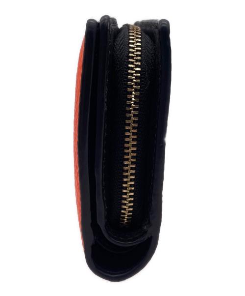 COACH（コーチ）COACH (コーチ) 2つ折り財布 オレンジの古着・服飾アイテム