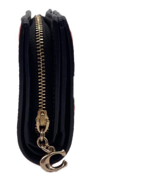 COACH（コーチ）COACH (コーチ) 2つ折り財布 オレンジの古着・服飾アイテム