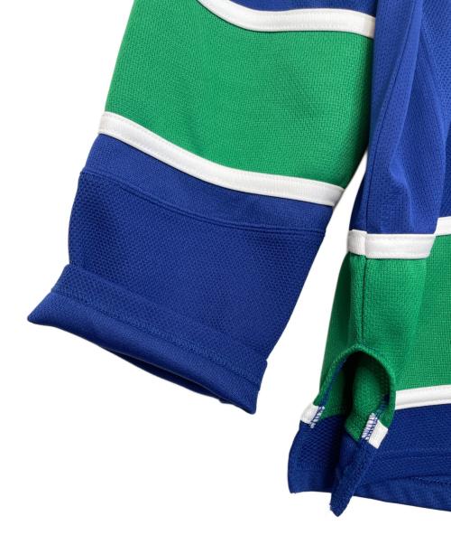 NHL（エヌエイチエル）NHL (エヌエイチエル) REEBOK (リーボック) REEBOK リーボック NHL Vancouver Canucks バンクーバーカナックス ジャージ ホッケージャージ サイズ:Mの古着・服飾アイテム