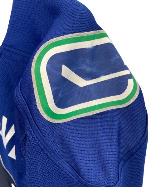 NHL（エヌエイチエル）NHL (エヌエイチエル) REEBOK (リーボック) REEBOK リーボック NHL Vancouver Canucks バンクーバーカナックス ジャージ ホッケージャージ サイズ:Mの古着・服飾アイテム