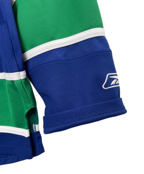 NHL（エヌエイチエル）NHL (エヌエイチエル) REEBOK (リーボック) REEBOK リーボック NHL Vancouver Canucks バンクーバーカナックス ジャージ ホッケージャージ サイズ:Mの古着・服飾アイテム