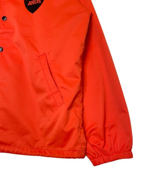 Schott（ショット）Schott (ショット) Schott ショット 110 PATTERNED LINING ドル柄裏地 コーチジャケット ブルゾン オレンジ オレンジ×ブラック サイズ:Mの古着・服飾アイテム