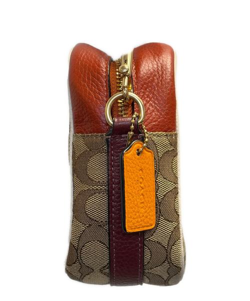 COACH（コーチ）COACH (コーチ) バッグ ベージュ×オレンジの古着・服飾アイテム
