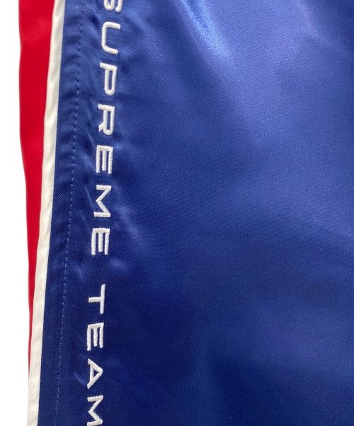 SUPREME（シュプリーム）Supreme (シュプリーム) トラックパンツ Satin Track Pant ブルー×レッド サイズ:Mの古着・服飾アイテム