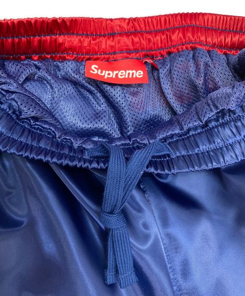 SUPREME（シュプリーム）Supreme (シュプリーム) トラックパンツ Satin Track Pant ブルー×レッド サイズ:Mの古着・服飾アイテム