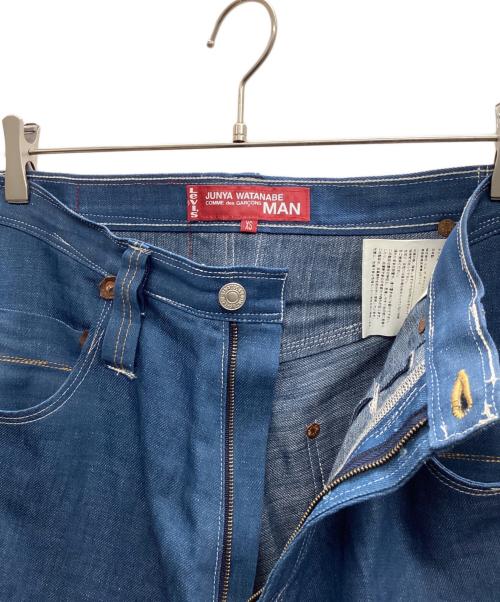 COMME des GARCONS JUNYA WATANABE MAN（コム デ ギャルソン ジュンヤ ワタナベ マン）COMME des GARCONS JUNYA WATANABE MAN (コム デ ギャルソン ジュンヤ ワタナベ マン) LEVI'S (リーバイス) デニムパンツ インディゴ サイズ:XSの古着・服飾アイテム