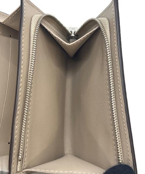 LOUIS VUITTON（ルイ ヴィトン）LOUIS VUITTON (ルイ ヴィトン) 2つ折り財布 ポルトフォイユ・イリス コンパクト ベージュの古着・服飾アイテム