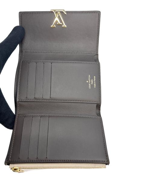 LOUIS VUITTON（ルイ ヴィトン）LOUIS VUITTON (ルイ ヴィトン) 3つ折り財布 ガレ ポルトフォイユ・カプシーヌ コンパクト グレージュの古着・服飾アイテム